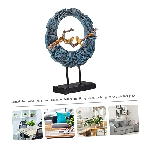 Oiseau sur branche en résine Cabilock pour décoration de table