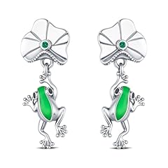 The frog jumped onto a lily pad