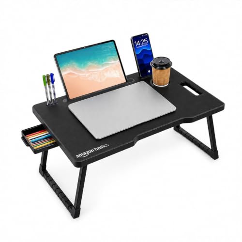 Image of Amazon Basics Engineered Wood Foldable Laptop Table with Cup and Pen Holder, Tablet and Mobile Phone Groove | Mini Drawer, Use for Writing, Bed, Breakfast (60L x 40W x 25H cm, Black)