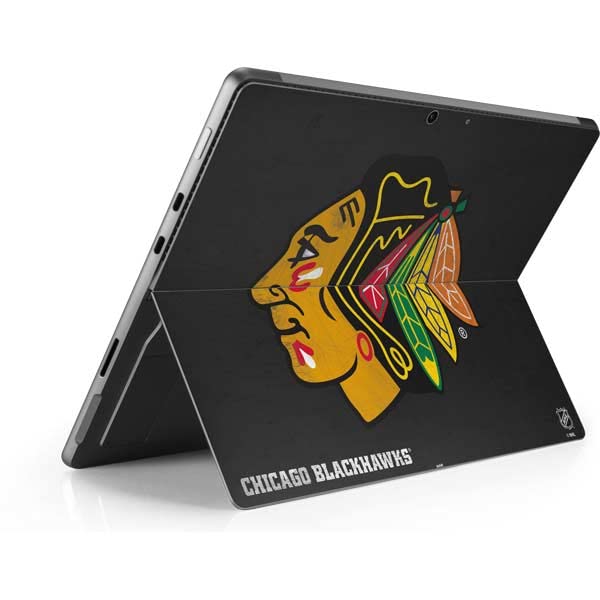 Skinit Tablet Decal Skin Compatible with Surface Pro 8 - Officially Licensed NHL Chicago Blackhawks Distressed Design