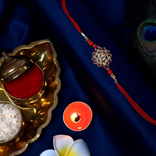 Image of Oblivion Kundan Lotus and Krishna Morpankh Rakhi Pair for Brother with Metal Pooja Thali, Two Dabbas, Roli Chawal, Coin and Greeting Card