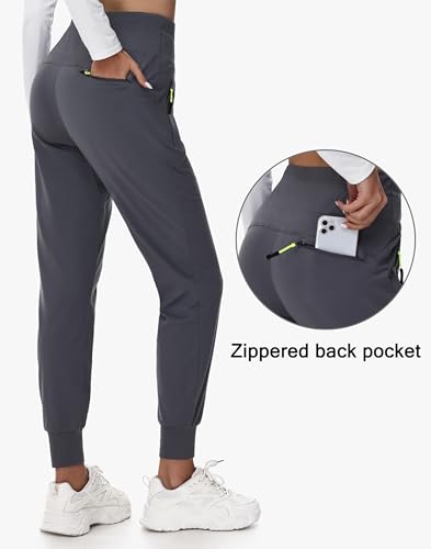 MIVEI Calça de moletom feminina forrada com lã para caminhada, resistente à água, com bolsos com zíp