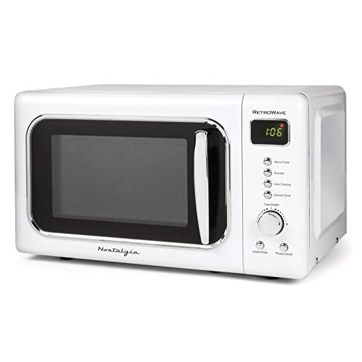Nostalgia Retro Compact Countertop Microwave Oven 0.7 Cu. Ft. 700-Watts with LED Digital Display, Child Lock, Easy Clean Interior, White
