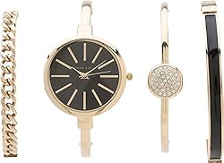 Black and gold bangle set with watch.