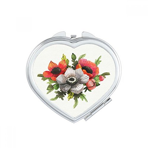Miroir maquillage compact en voyage : retouches faciles avec ce miroir portable mignon