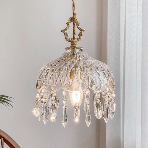 Lustre en verre transparent moderne pour illuminer un salon trop sombre