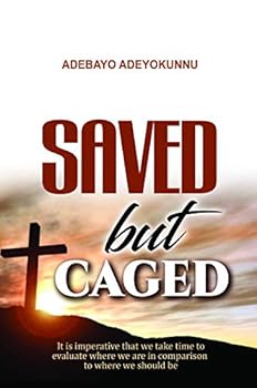 Paperback Saved But Caged Book