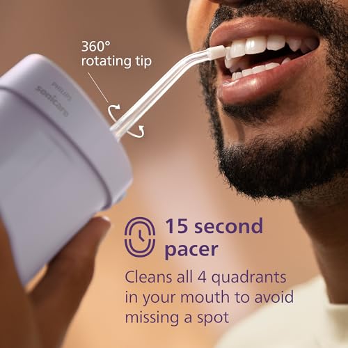 Image of Philips Sonicare Compact Flosser 1000, Portable Water Flosser with 3 Flossing Modes, IPX7 Waterproof Oral Irrigator, Travel Friendly, Purple, Model HX3333 /23