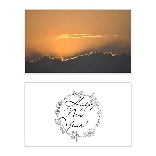 Tarjeta conmemorativa de año nuevo color naranja y cielo oscuro rústica