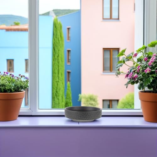 Nénuphars et fleurs en pot de fleurs céramique noire style zen