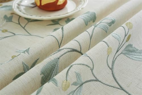 Nappe rectangulaire 140x200 cm lavable en polyester jacquard et pompons