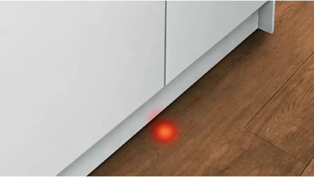 InfoLight red dot projected on the floor from the dishwasher
