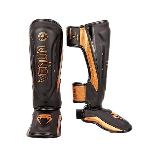 Venum Caneleiras Elite Evo - Preto/Bronze - M