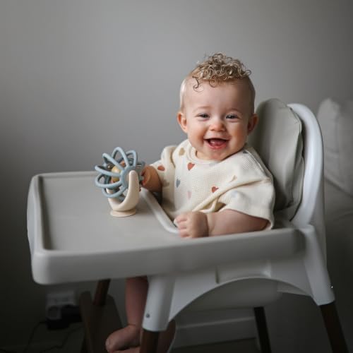 Image of mushie Suction Spinner Ball Toy | Toddler Sensory Toys for Bath & Play