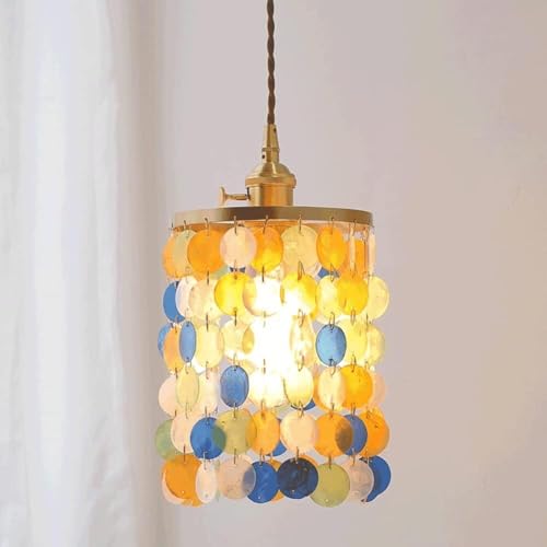 Lampe suspendue ronde en cristal pour illuminer votre salon chaleureux