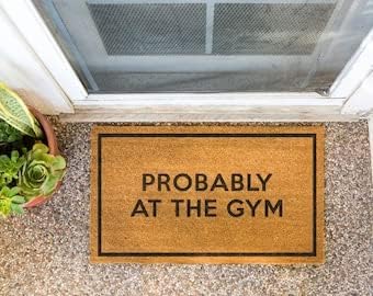 Probably at The Gym Doormat, for a Gym Lover, Housewarming Gift, New Home Gift, Welcome Mat, Gym Themed Doormat, Natural Coir, Non-Slip Backing Front Door Mat
