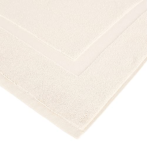 Image of Amazon Basics Banded Bathroom Bath Rug Mat, Machine Washable, Super Absorbent, 100% Cotton, 20 inch W x 31 inch L, Cream (Pack of 2)