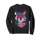 Entrez dans un pays des merveilles d'hiver fantaisiste avec ce ravissant ours en patchwork. Avec un mélange ludique de motifs et de couleurs, c'est un ajout charmant à votre collection de vacances.
