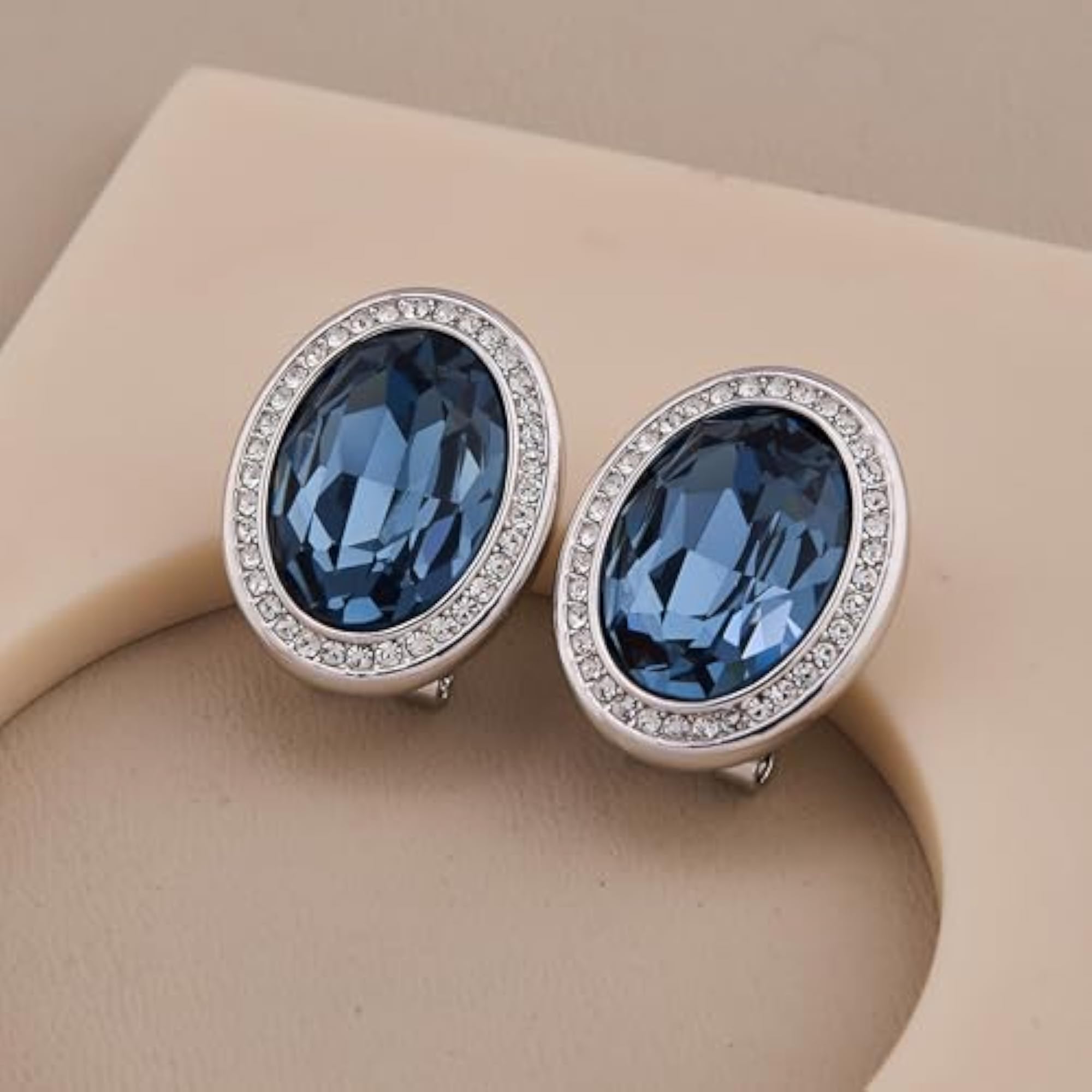 Women's Oval Blue Stone Stud Earrings with American Diamond Halo