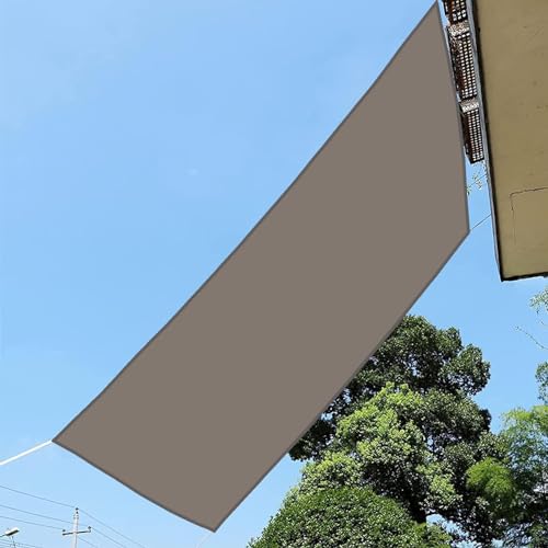 Toile d'ombrage imperméable pour protéger un long balcon du soleil