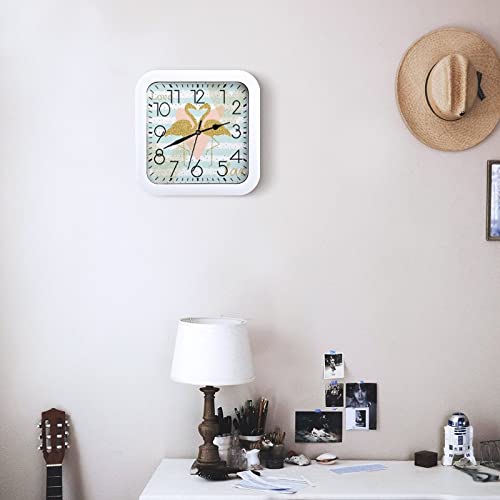 Pendule murale silencieuse flamant doré pour concentration au bureau