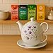 Tetera de porcelana, juego de té para uno Imagen de Tetera de porcelana, juego de té para uno