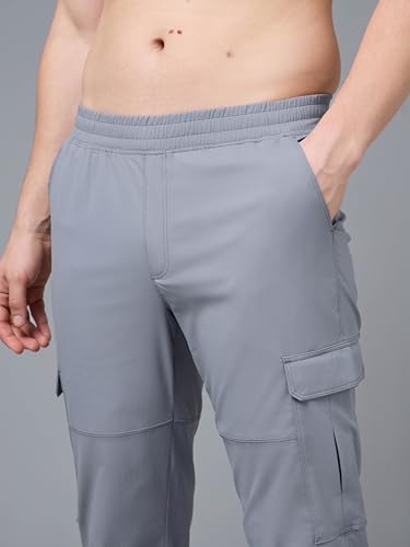 Image of TECHNOSPORT Men's Solid Straight Fit Cargo Pants TS Flexi 6 Pocket Polyester Quick Dry Elasticated Drawstring for Gym Travel Running Workout