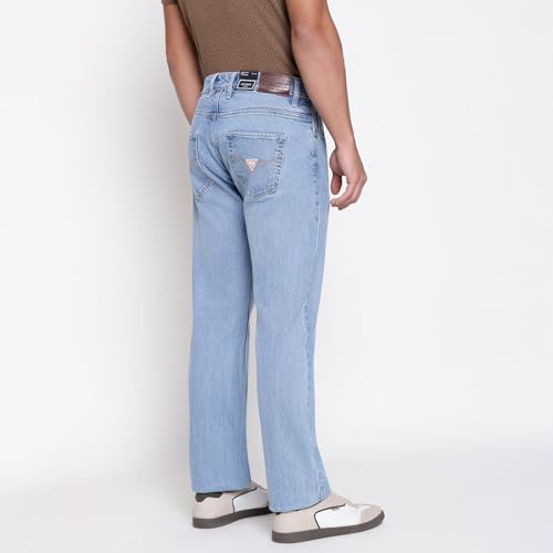 Image of GUESS Men Rodeo in Light Solid Relaxed Fit Denim Jeans