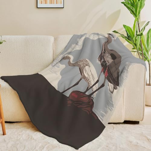 Plaid deux hérons douceur flanelle pour cocon de chaleur