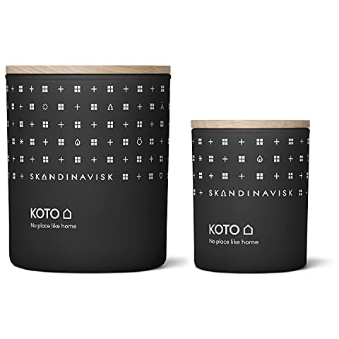 Skandinavisk Koto Large & Mini 'Home' Scented Candle Bundle. Fragrance Notes: Vanilla Beans and Dried Orange Peel, Amber and Leather. 7.0/2.3 oz. Cover
