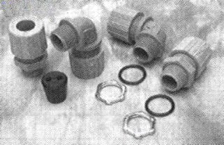 Woodhead 5594-008 Cable Strain Relief Grip, Max-Loc Cord Seal, Specialty Multi-Hole, 1/2" NPT Thread Size, Yellow Grommet Color, 2, 3, 4, 5, 6, or 7 Holes, .187" Cable Diameter