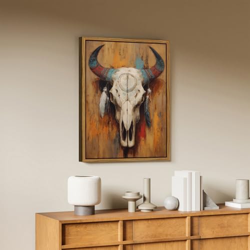 Image of Western Bull Skull Wall Art Framed Rustic Tribal Cow Skull Painting with Feathers, Southwestern Boho Canvas Wall Decor Western Farmhouse Artwork for Living Room Bedroom Office Home Decorations 16x24