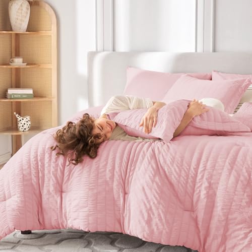 Image of MUXHOMO 7 Pieces Oversized King Comforter Set, Seersucker Bed in a Bag Oversized King Size, All Season Luxury Bedding Set with Comforter, Flat Sheet, Fitted Sheet, Pillowcases & Shams, Pink