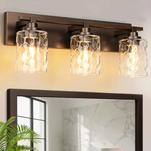 Image of Bathroom Light Fixtures,3-Light Oil Rubbed Bronze Vanity Lights Over Mirror | Modern Wall Light,Clear Ripple Glass Shade,Sturdy Metal Frame,For Bathroom Remodel,Easy Install,E26 Socket,ETL-Listed 20-inch