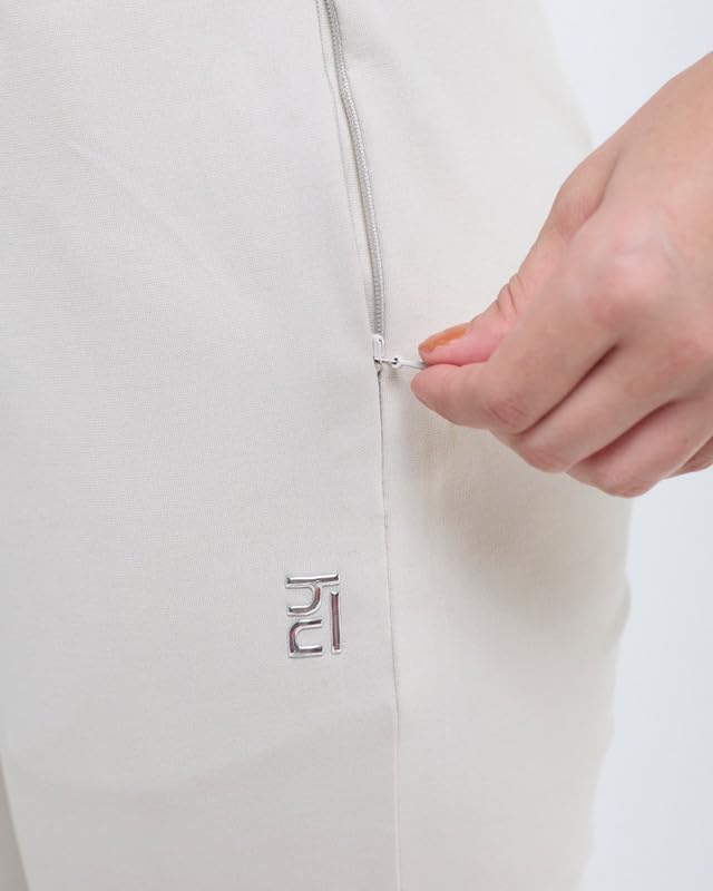 Image of HUNNIT Essential Flare Pants for Women with Zip Pockets | Mid Waist Solid Cotton Tapered Flare Pants | Bootcut Flared Trousers with Wide Elastic Waistband | Relaxed Fit Flared Trouser