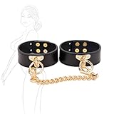 Design élégant : Bracelet en similicuir noir avec détails dorés, chaîne et anneau décoratif pour un look sophistiqué.