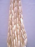 Natural Bone or Horn (dependent on color) Handmade Centerhole is approximately 1.5 mm in diameter
