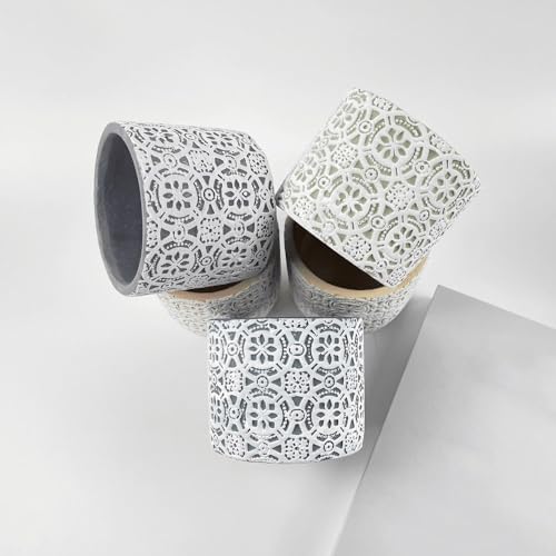 Jardinière avec trou de drainage et motif relief blanc sur fond vert pour plantes de balcon