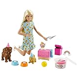 Weiteres Zubehör sind Partyhüte für die Hündchen, ein Kuchenschieber und ein Geschenkkarton, der sich öffnen und schließen lässt und einen Spielzeugball für Barbies Hündchen enthält