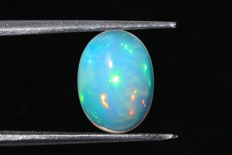 Cabochon d'opale éthiopienne AAA gemme naturelle multi feu unique pour haute joaillerie