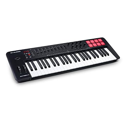 M-Audio Oxygen 49 (MKV) - teclado controlador MIDI USB con 49 teclas, beat pads, Smart Chord, modos de escala, arpegiador y pack de sonidos de Native Instruments (integración de NKS)