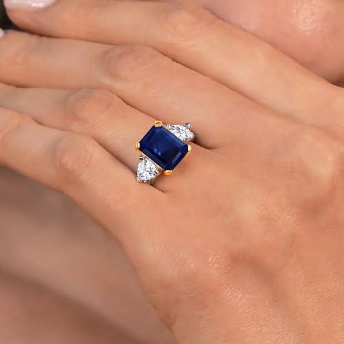 Gem Stone King 925 Sterling Silver and 10K Yellow Gold Blue Sapphire and White Moissanite 3 Stone Engagement Ring For Women (4.58 Cttw, Emerald Cut 10X8MM, Available In Size 5, 6, 7, 8, 9)4