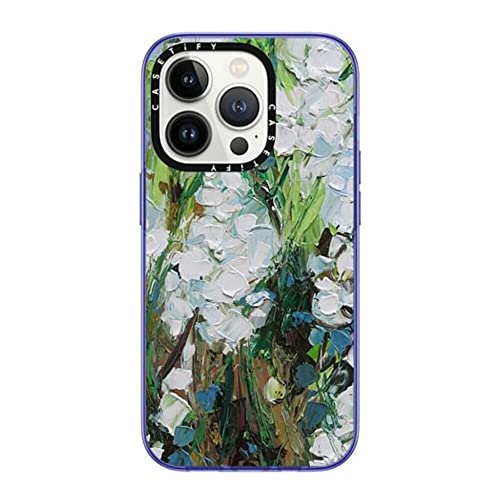 Coque iPhone 14 Pro CASETiFY compacte fleurie violette