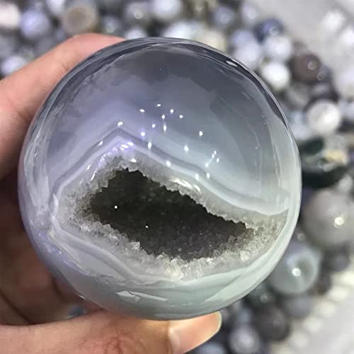 Pierre de cristal en boule d'agate transparente d'exception avec géode naturelle