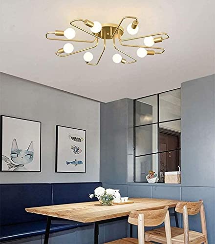 Lustres Mid Century dorés pour illuminer la table de votre salle à manger