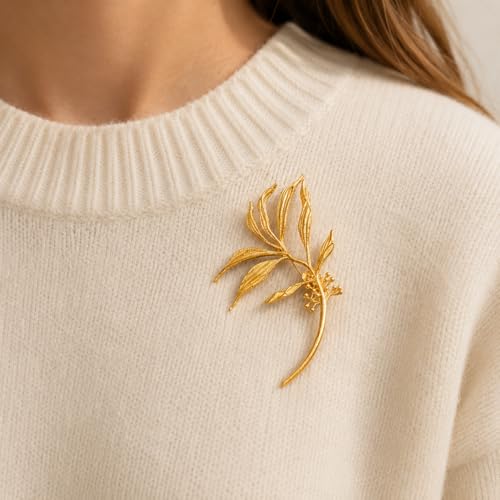 Broche feuillage haute finition brillante pour une allure luxe