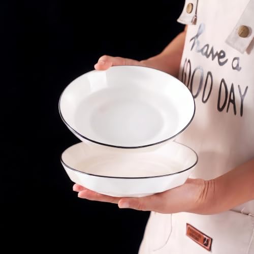 Image of Premium White Ceramic Pasta Dishes Set of 2, 7-Inch Large Shallow Salad Plates with Elegant Black Rim, Modern Geometric Faceted Design, Stackable, Microwave & Dishwasher Safe Dinnerware
