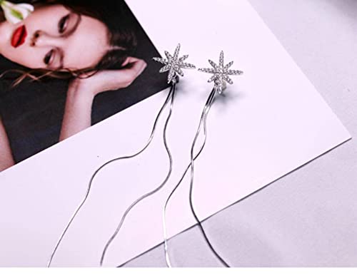 Boucles d'oreilles à pompon et étoile en argent, le cadeau idéal