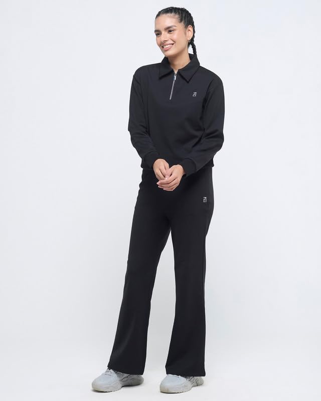 Image of HUNNIT Essential Flare Pants for Women with Zip Pockets | Mid Waist Solid Cotton Tapered Flare Pants | Bootcut Flared Trousers with Wide Elastic Waistband | Relaxed Fit Flared Trouser