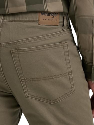 The Best Jeans for Men Over 50: Look Sharp, Feel Great in 2026 16 Wrangler Authentics Men's Regular Fit Comfort Flex Waist Jean, Stone Grey Canvas, 36 x 36